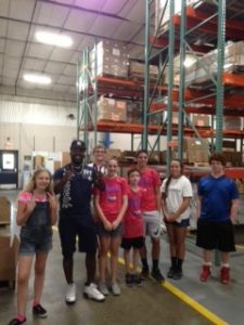 photo Cathys iPhone Summer Learn and Lead students with trainee1 e1467389909122 225x300 - Students Learn How Donations Turn into Job Training