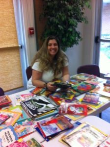 Teacher Natalie Hinkle selecting books for her classroom!