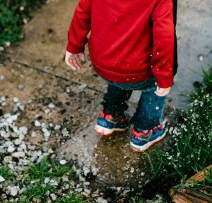 Stomping in puddles.